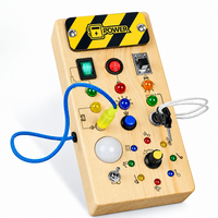 Thumbnail for TinyTech – Tablero de actividades de madera con luces e interruptores – Juguete educativo