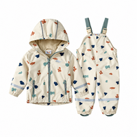 Thumbnail for TinyBreeze – Impermeable y cómodo: conjunto de chubasquero y pantalones de lluvia para niños