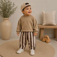 Thumbnail for SoftStripe – Suaves y cómodos: pantalones para bebé con diseño a rayas