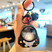 Thumbnail for Glowing Astronaut Charm – Bonito y luminoso: colgante de bolso con forma de astronauta