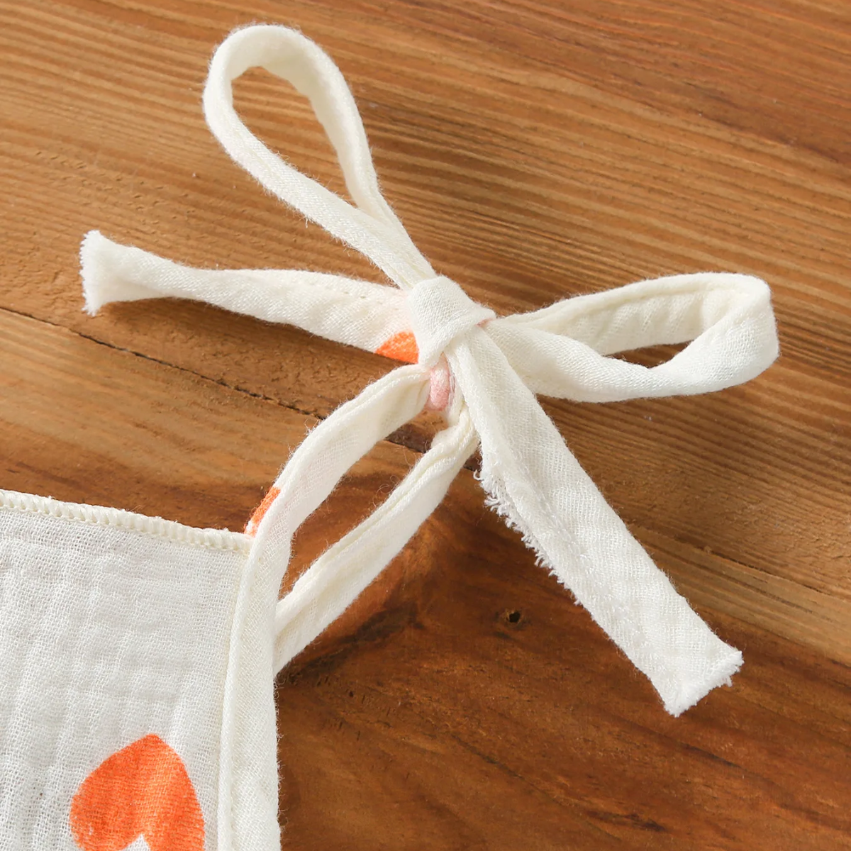 LittleBlossom – Comodidad y estilo para el verano: body tipo portabebés con gorrito