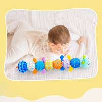 Thumbnail for CuddleCater – Estimulante para los sentidos y el desarrollo – Sonajero para bebés