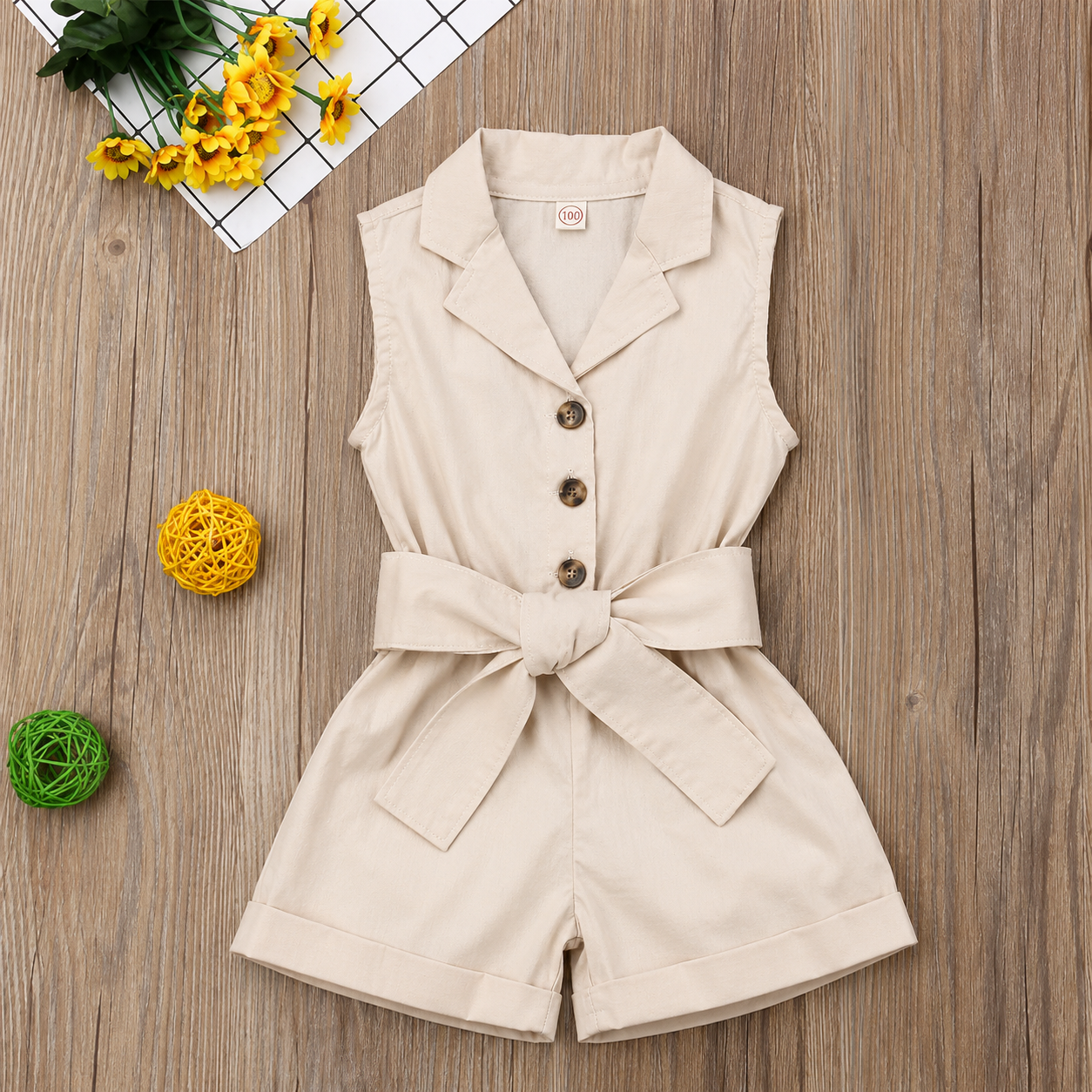 LittleLady – Elegancia y tendencias  – Mono con cinturilla con lazo