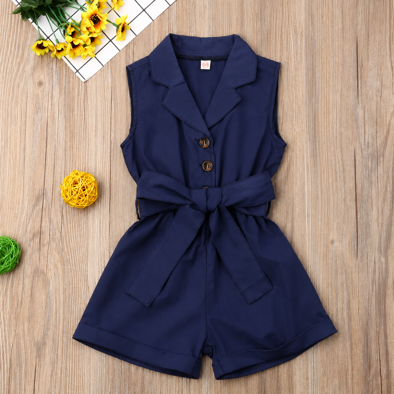 LittleLady – Elegancia y tendencias  – Mono con cinturilla con lazo