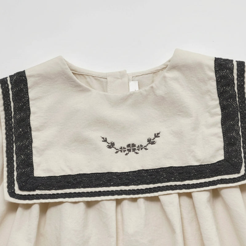Sailor Top – Elegante y cómoda: camisa con detalles de encaje y mangas abullonadas