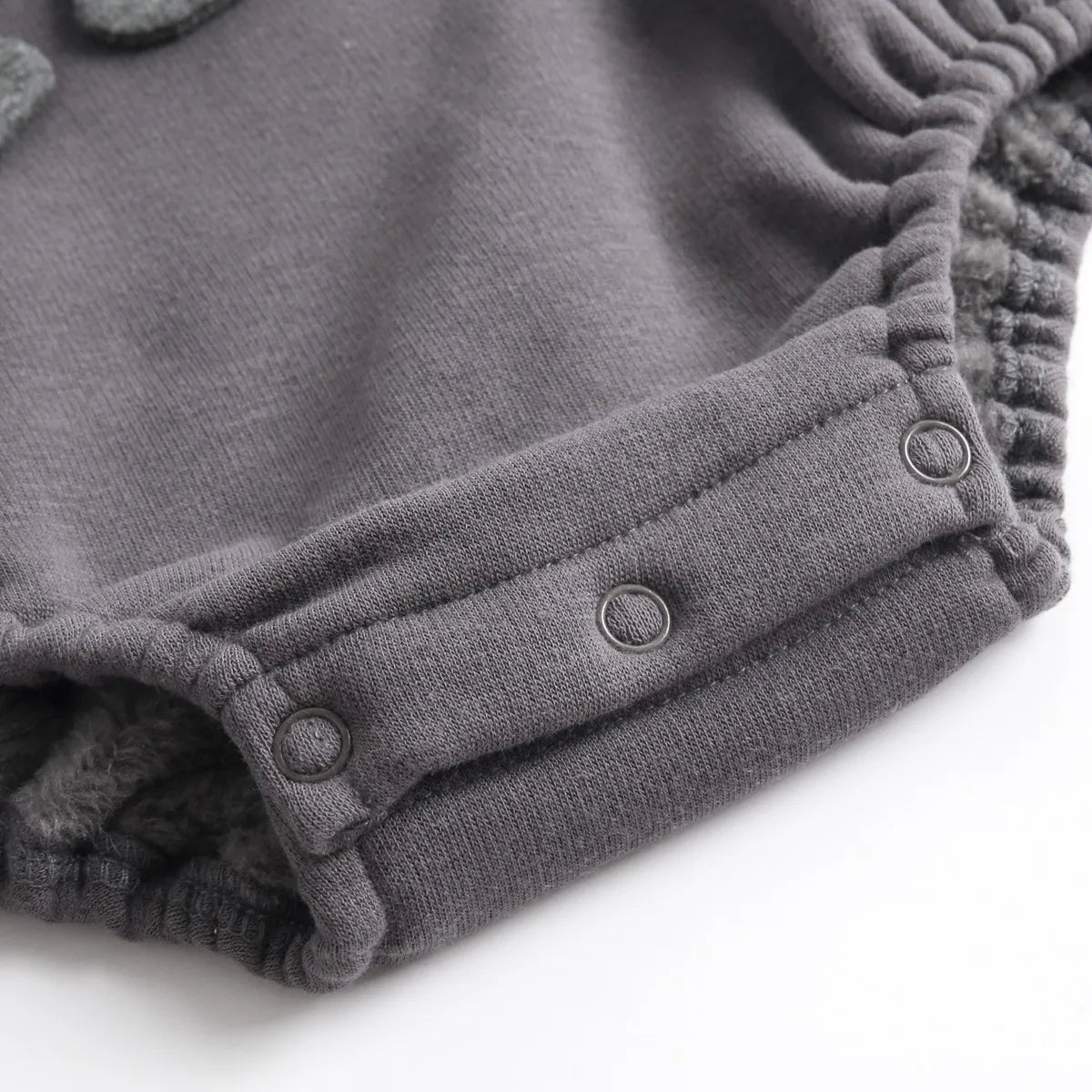 Mini Fashion – Suave body de forro polar con estampado de Dino