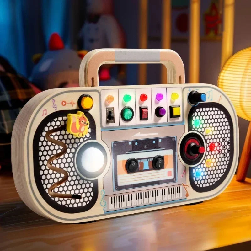 Wooden Busy Board – Motricidad e interactivo – Tablero de actividades musicales
