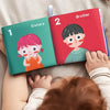 Crinkle Book™ – Diversión Knisper – Libro ilustrado de tela