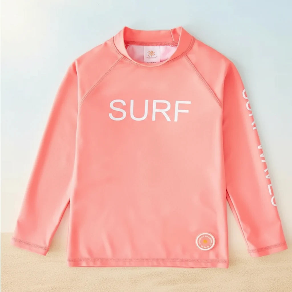 SunShield – Protectora y flexible: camiseta de surf para niños con manga larga y UPF 50+.