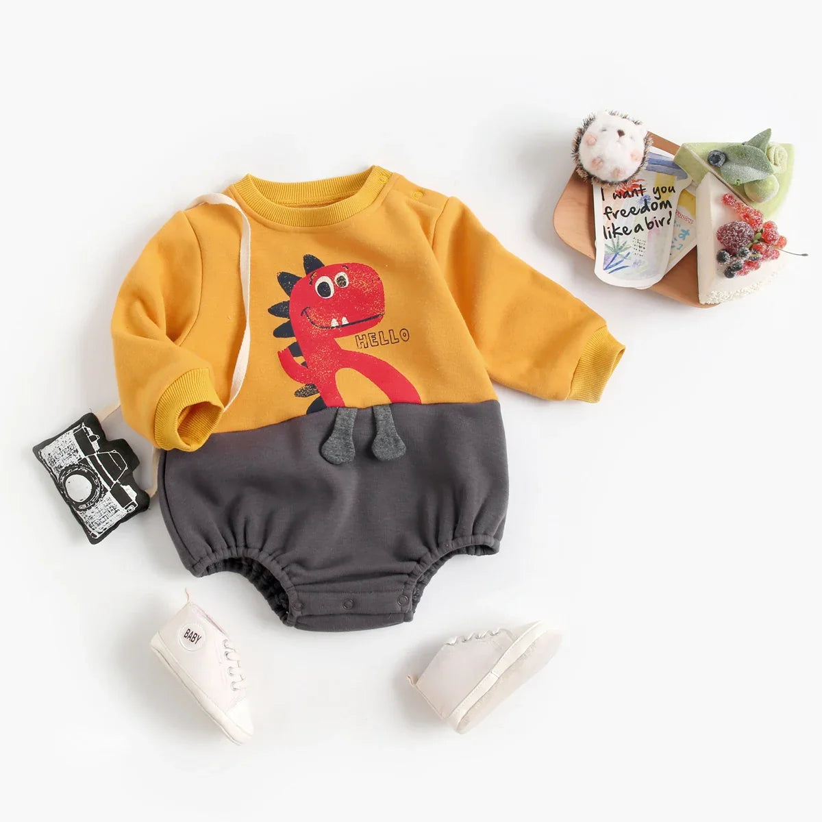 Mini Fashion – Suave body de forro polar con estampado de Dino