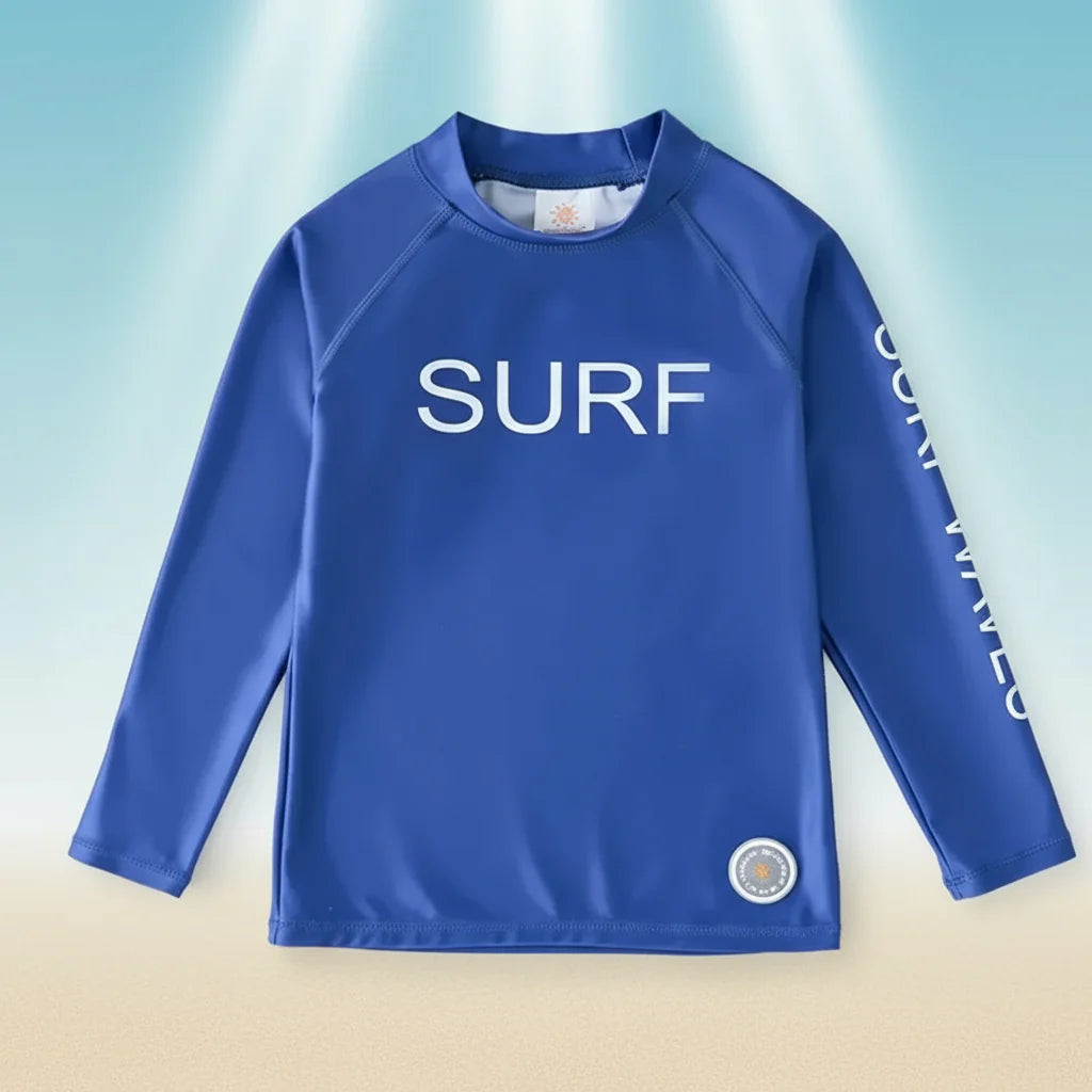 SunShield – Protectora y flexible: camiseta de surf para niños con manga larga y UPF 50+.